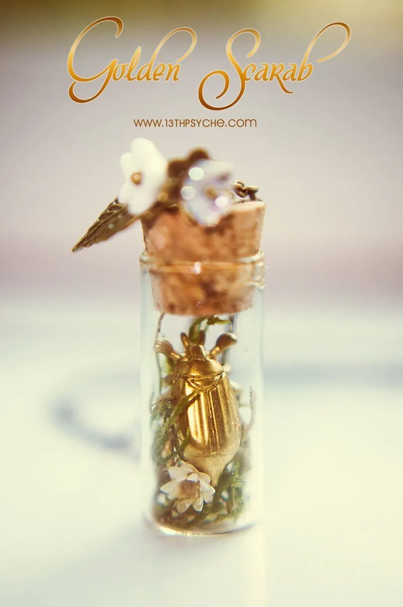 Golden beetle bottle pendant necklace